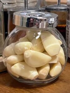 jar full of fresh peeled garlic cloves
